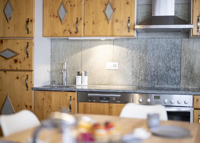 Апартаменты Chasa Rustica *